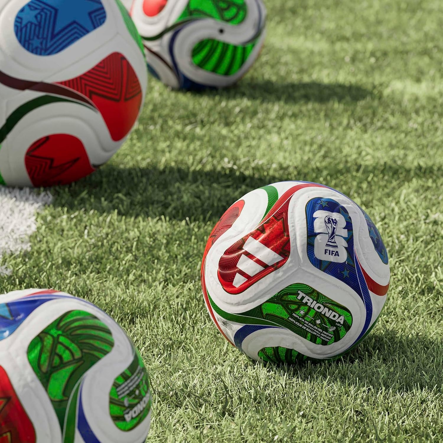 image:imageadidas FIFA World Cup 26 Trionda Mini Soccer BallWhiteTeam Royal BlueSolar BluePower RedTrionda