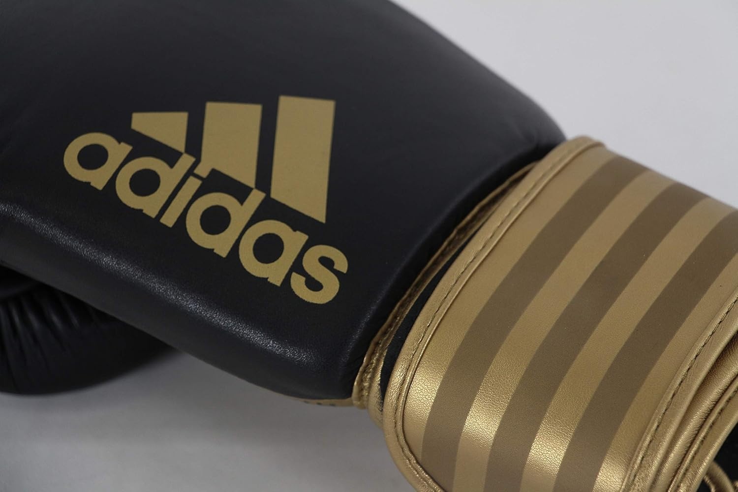 image:imageadidas Hybrid 200 Leather Boxing and Kickboxing Gloves for Women amp MenBLACKGOLD